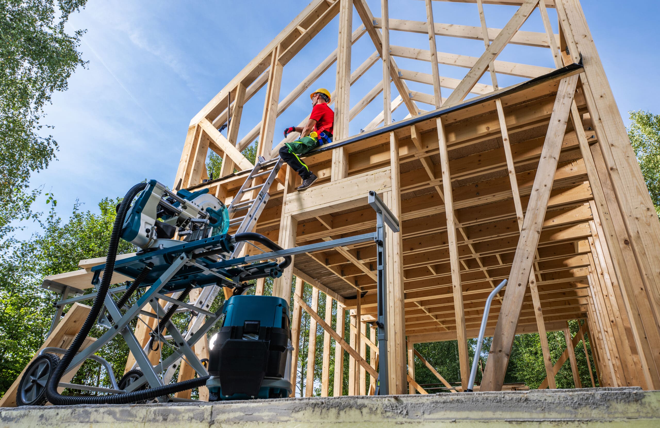 Wooden Skeleton Frame Contractor Taking Short Lunch Break While in the Job